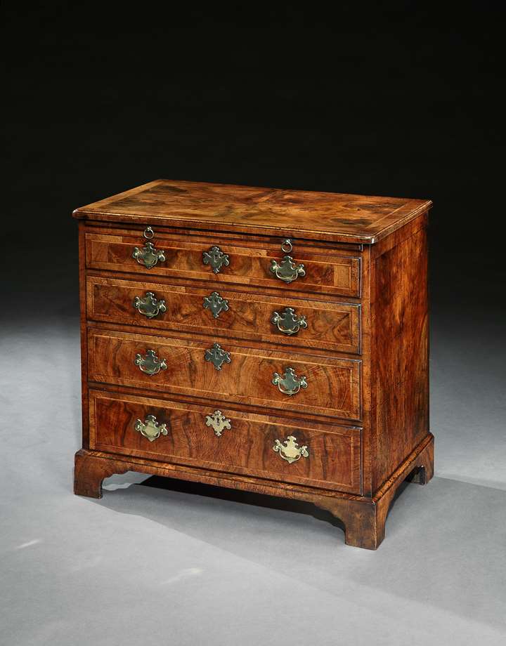 A George II burr walnut chest of drawers